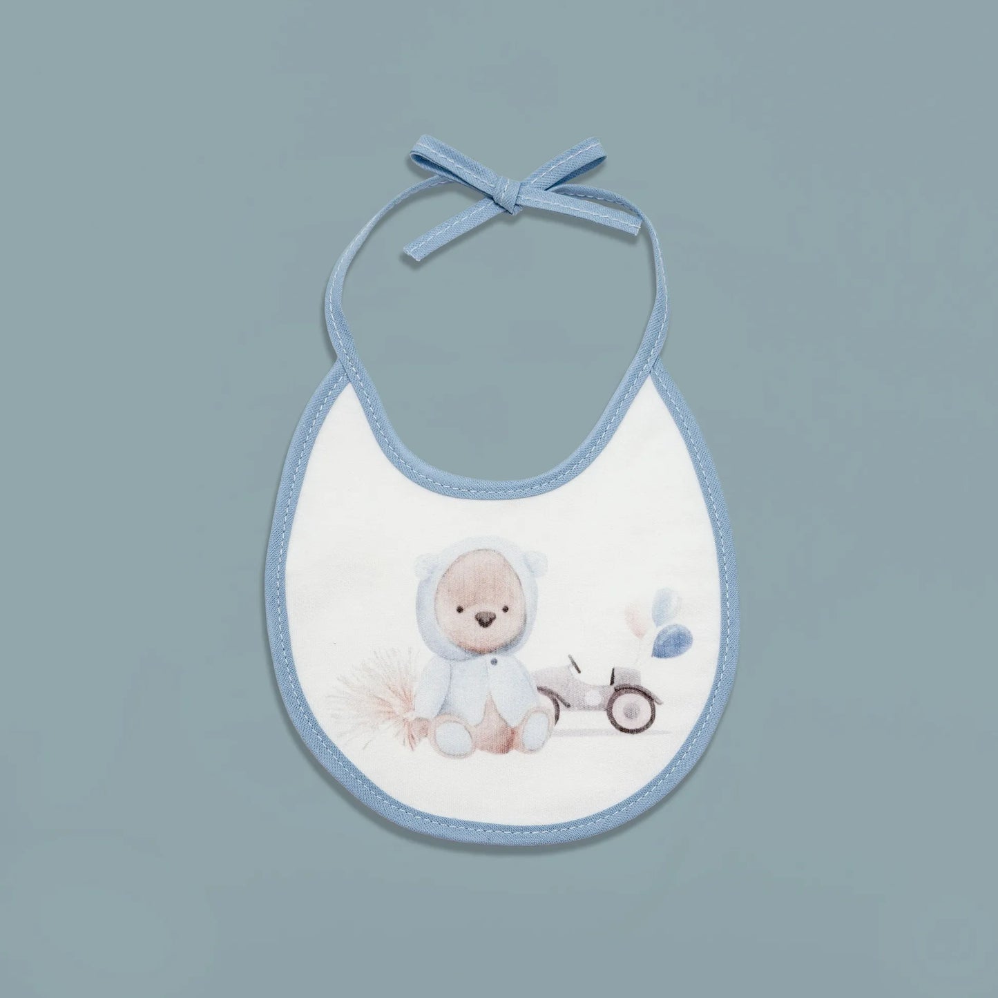 Babero con motivo de osito con capucha azul