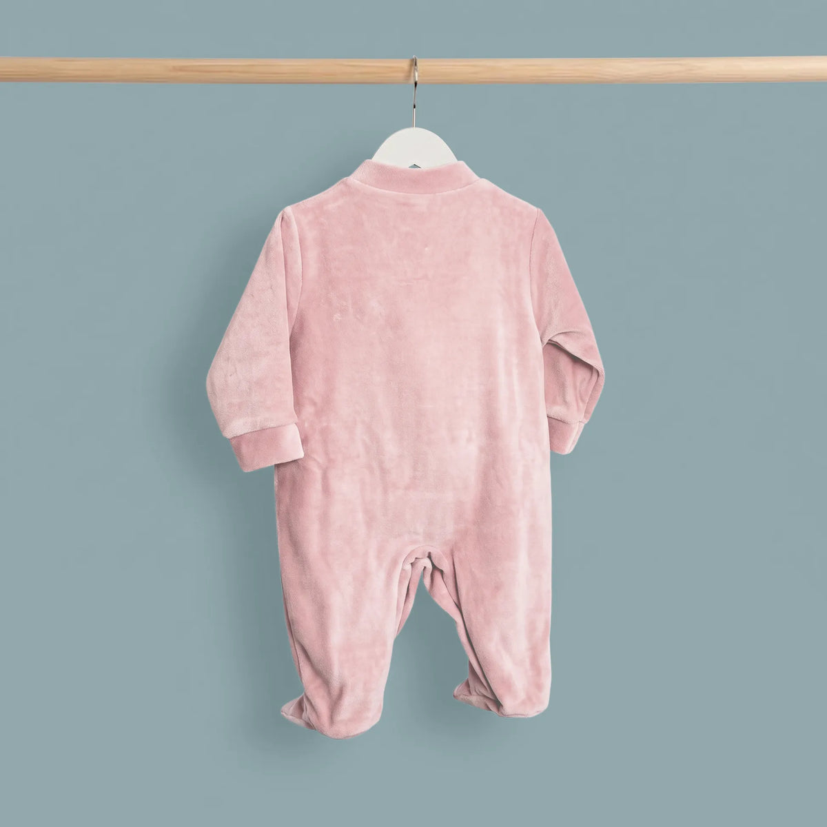 Babygrow aveludado com renda e lacinho na frente rosa