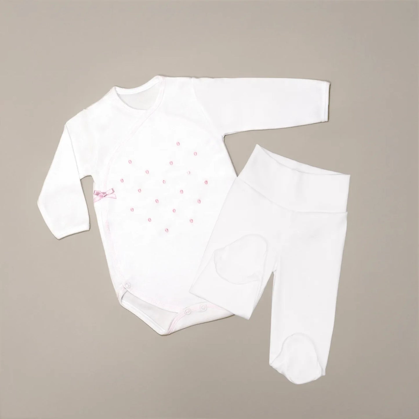 Body cruzado con pantalones com pies con bordado de lunares rosa