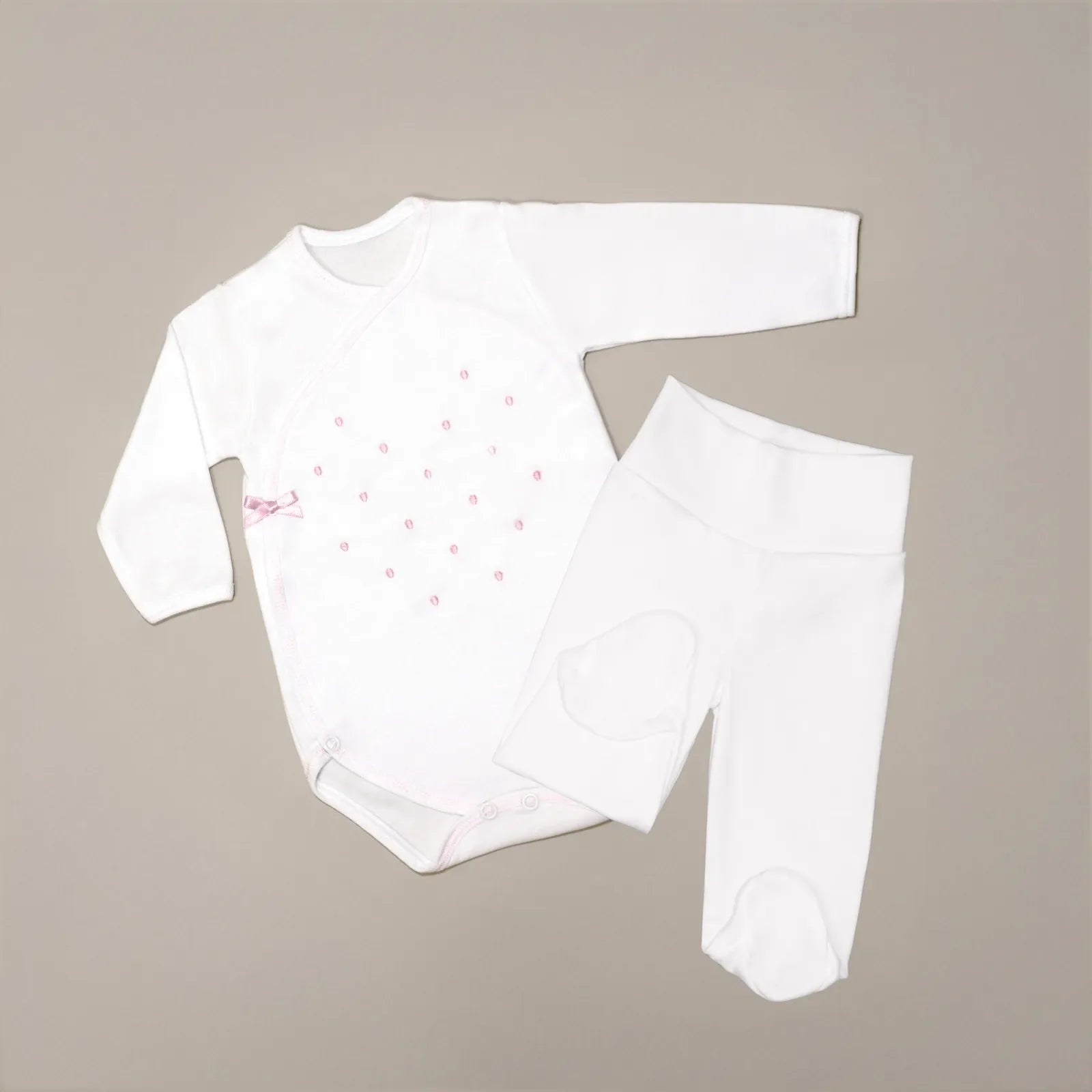 Body cruzado con pantalones com pies con bordado de lunares rosa