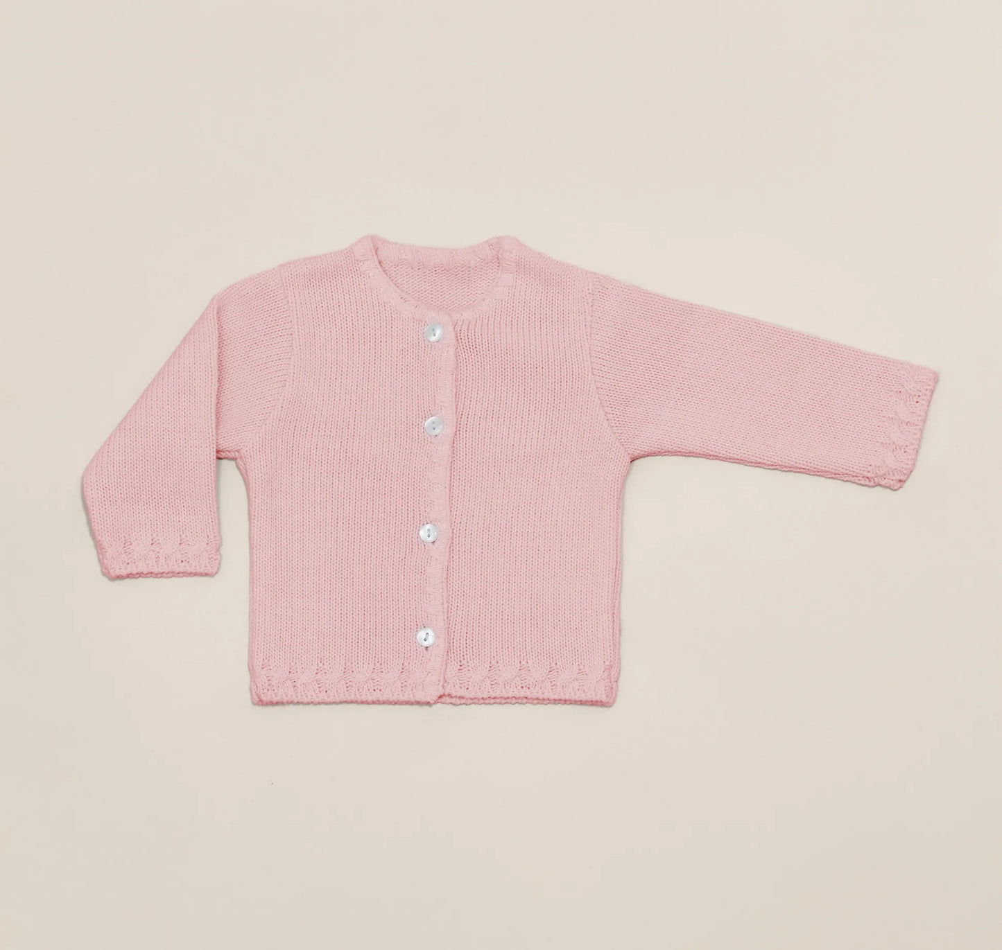 Chaqueta de punto con detalles trabajados en los bordes rosa