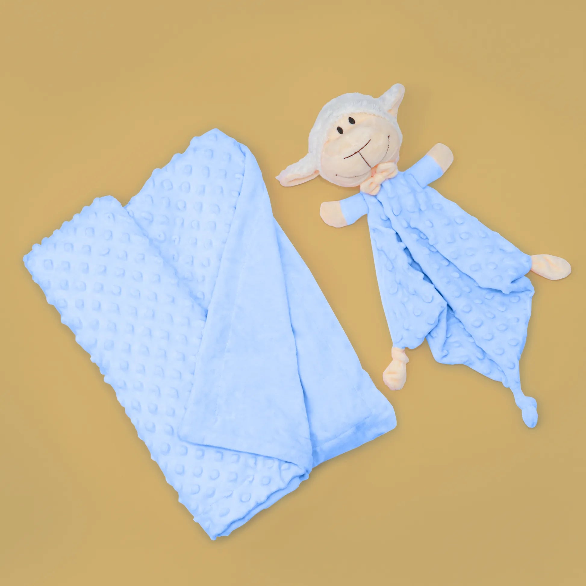 Conjunto de manta y doudou oveja con detalles en relieve azul