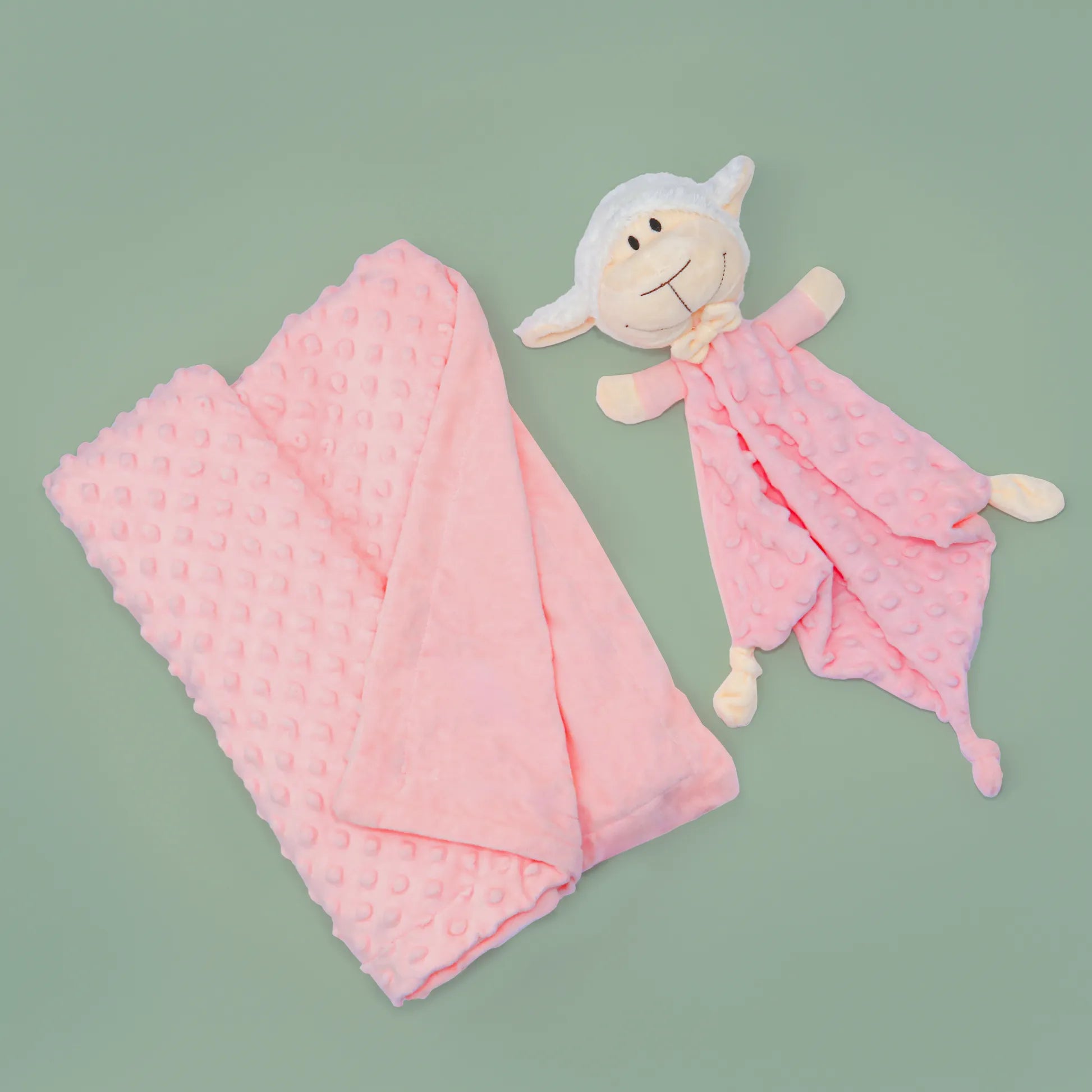 Conjunto de manta y doudou oveja con detalles en relieve rosa