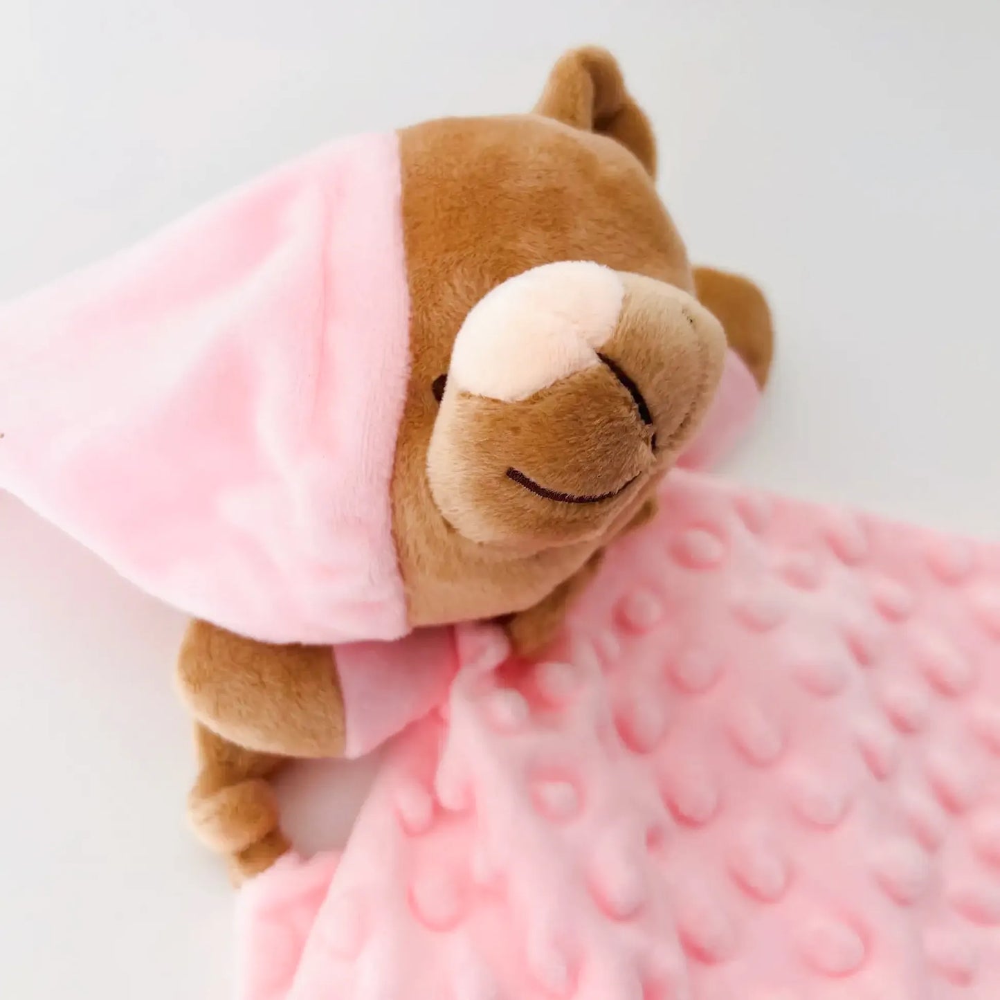 Doudou del conjunto de manta y doudou osito con detalles en relieve rosa
