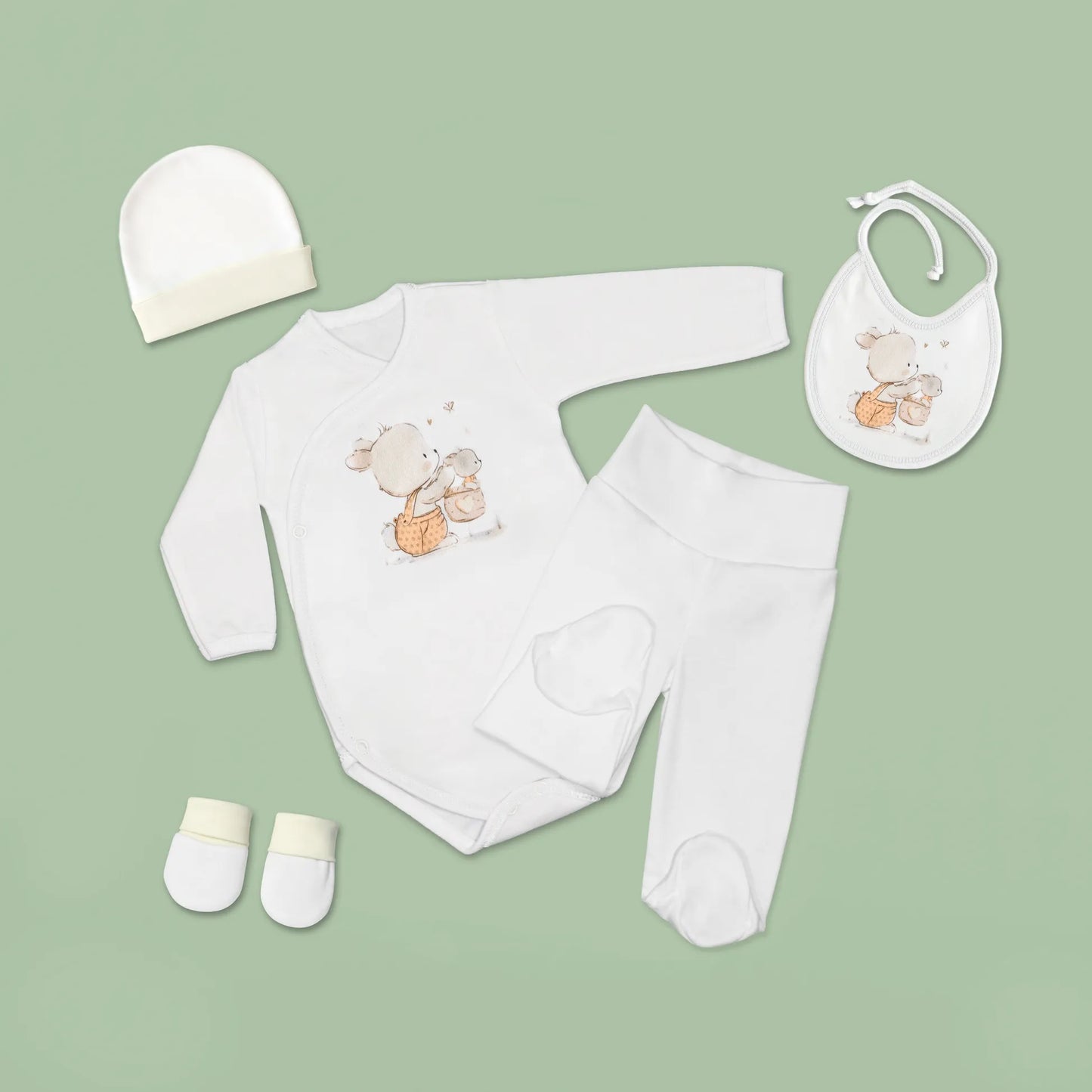 Conjunto de primera puesta con motivo de conejito en la cesta beige