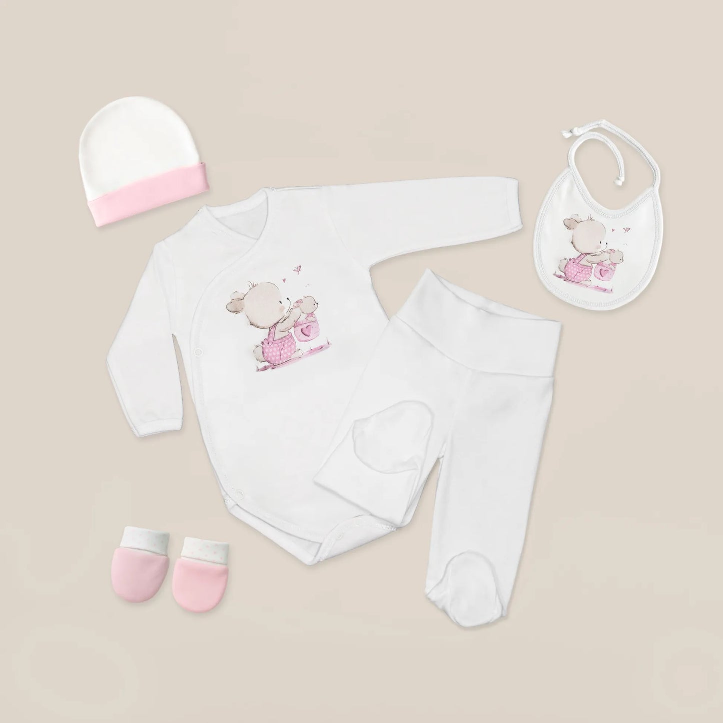 Conjunto de primera puesta con motivo de conejito en la cesta rosa