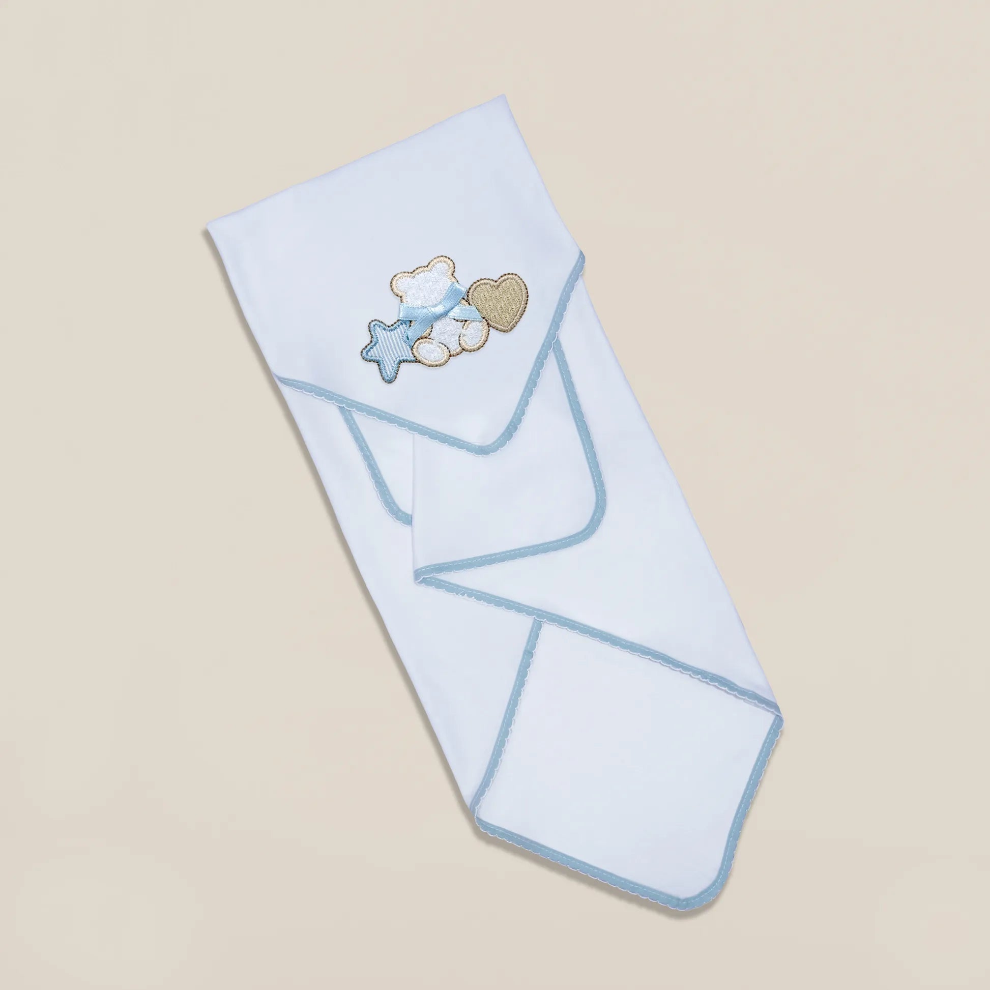 Paño para eructar con motivo de osito entre estrella y corazón azul