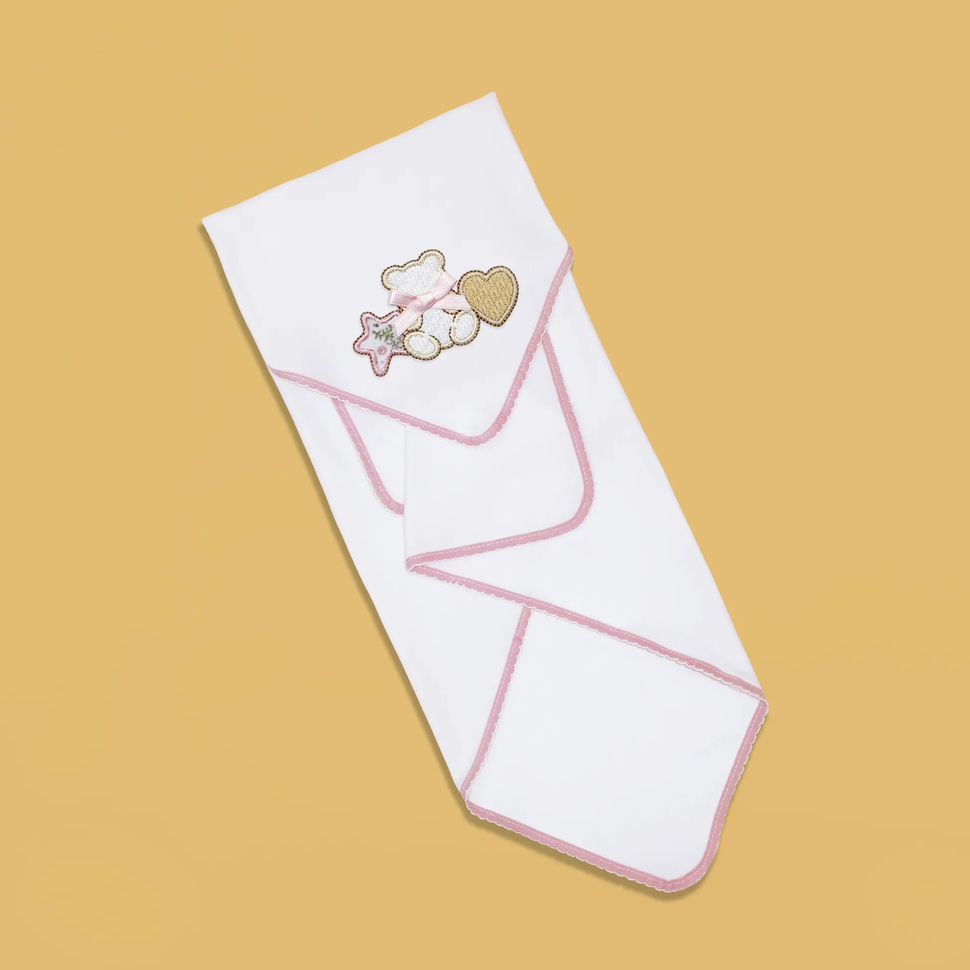 Paño para eructar con motivo de osito entre estrella y corazón rosa