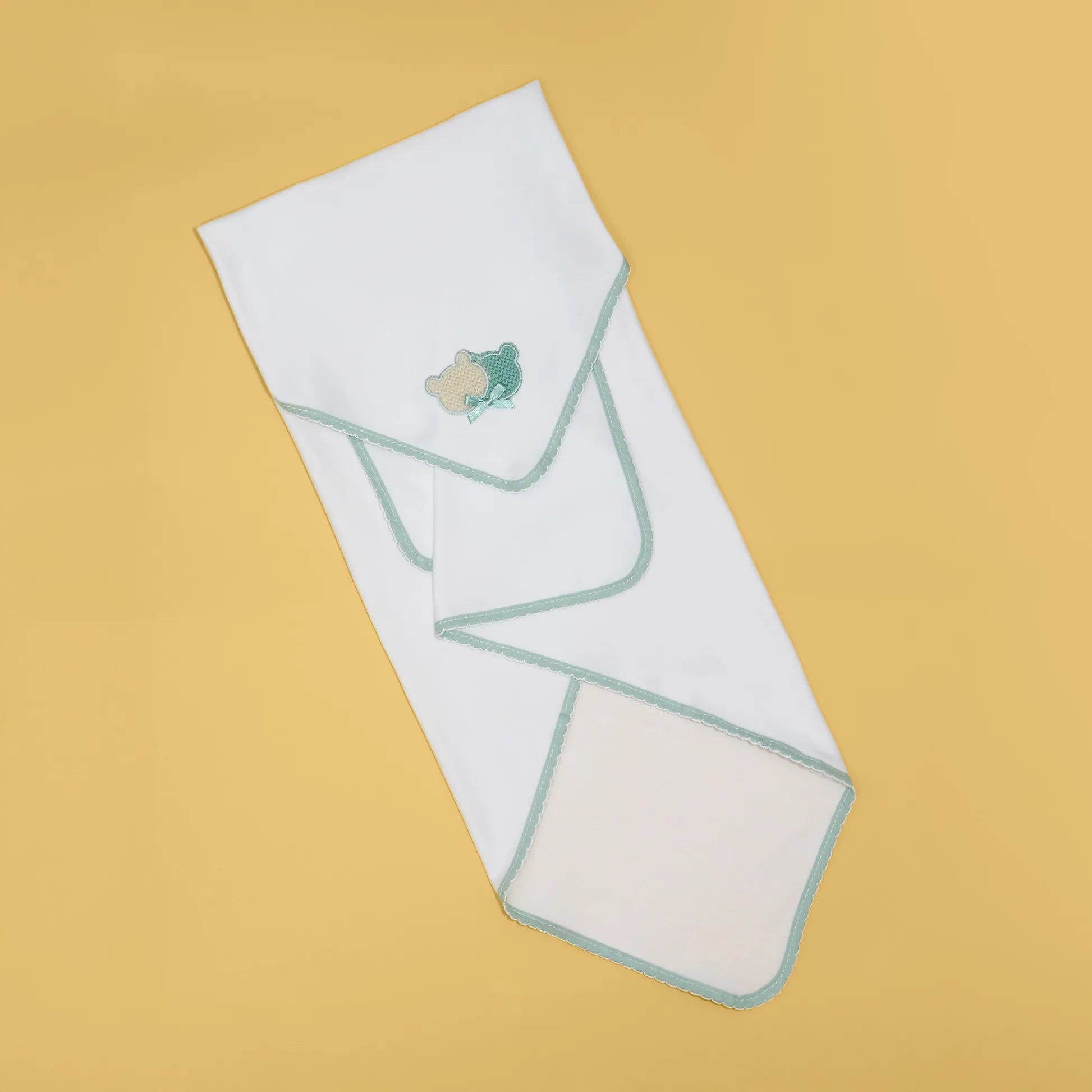 Paño para eructar con motivo de ositos de punto y lazito verde