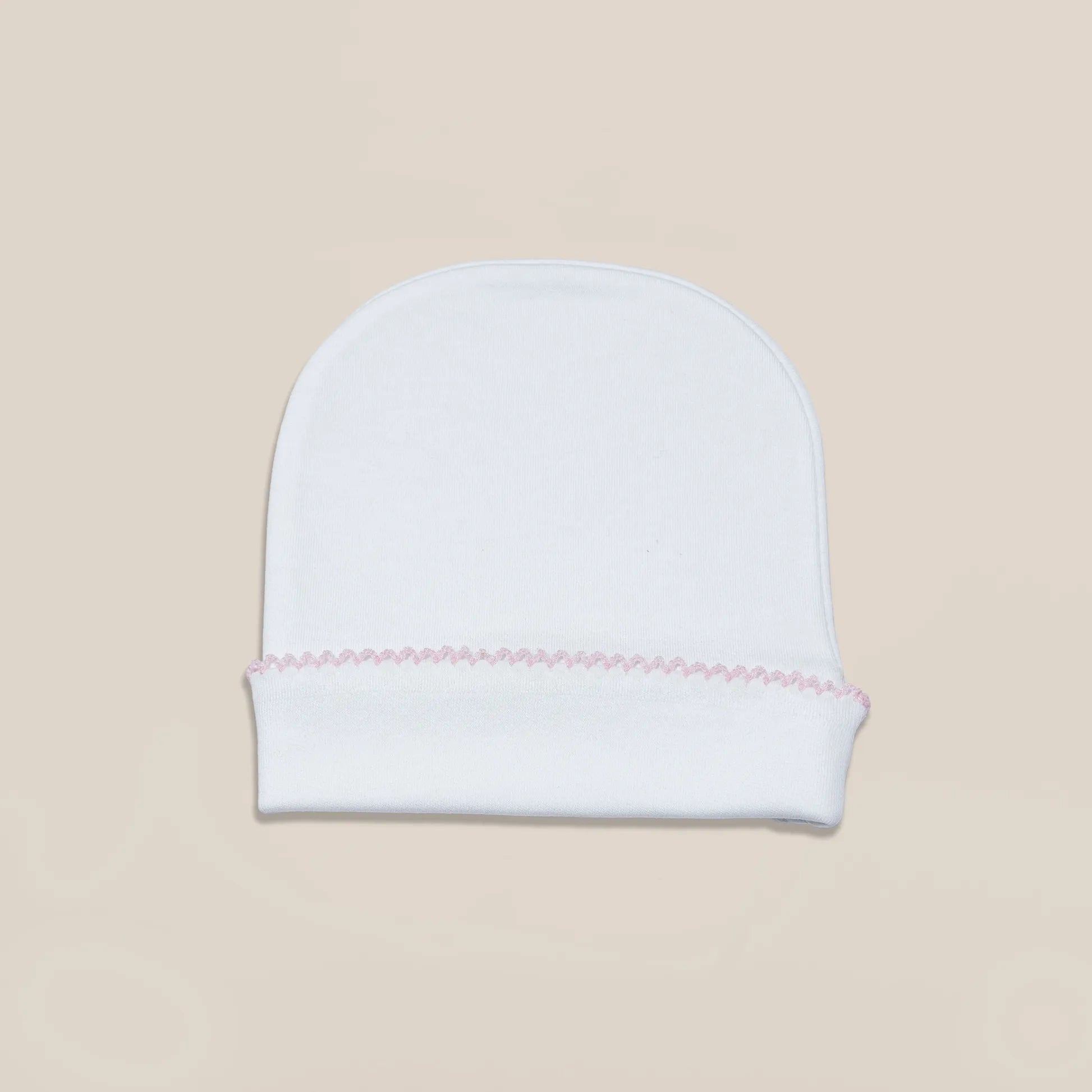 Gorro blanco con puntilla de color en el doblez rosa