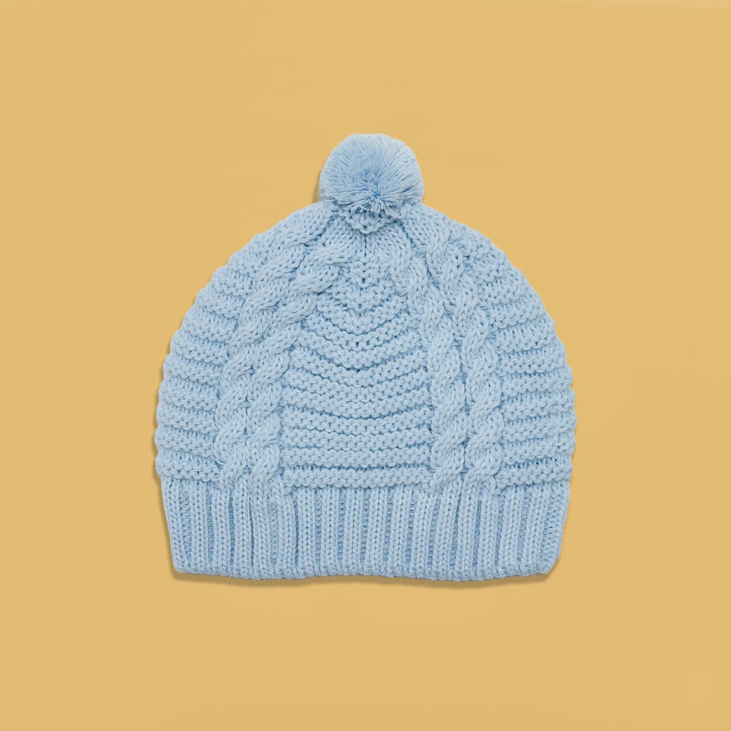 Gorro de punto trenzado con pompón azul