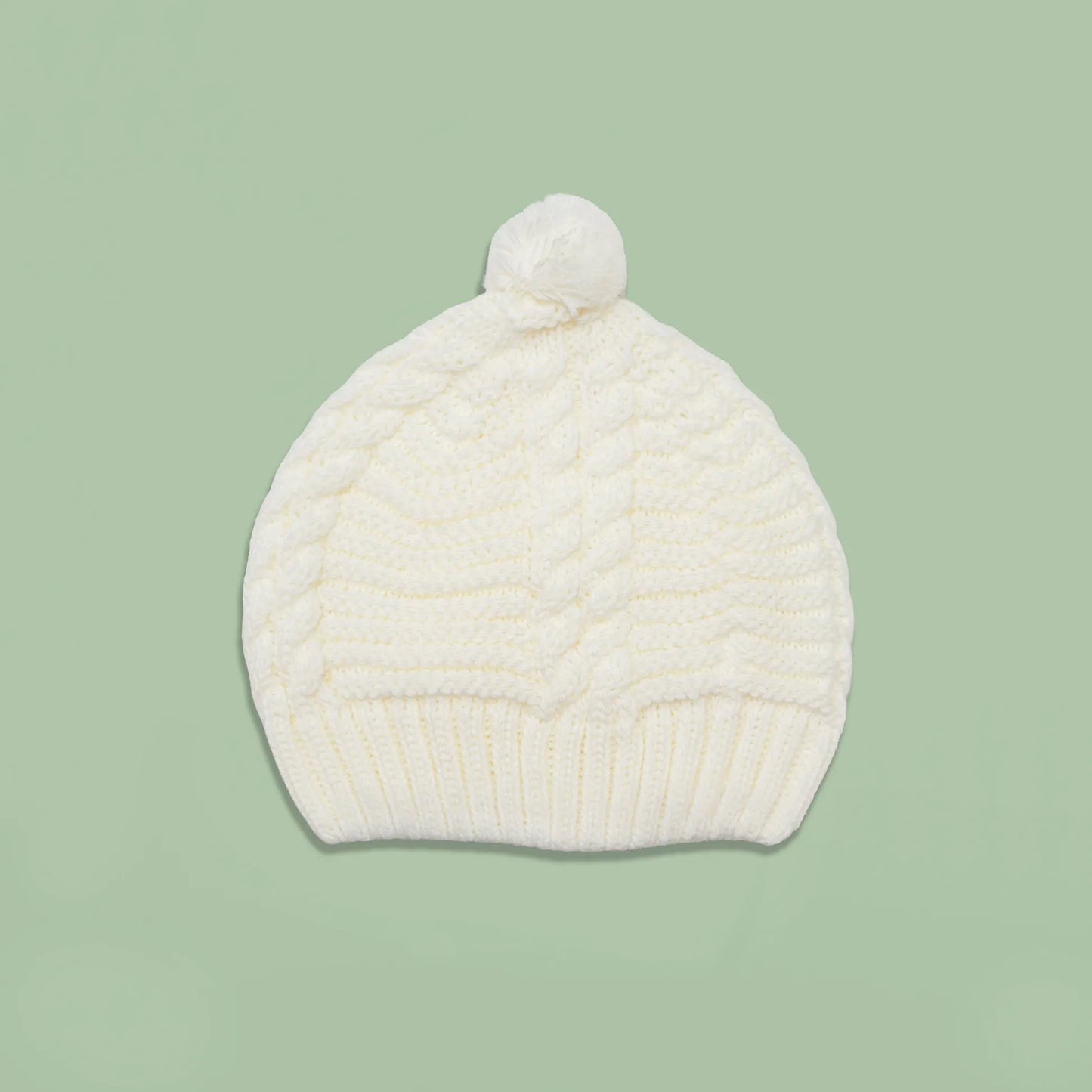 Gorro de punto trenzado con pompón perla