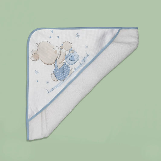 Toalla con motivo de conejito en la cesta azul