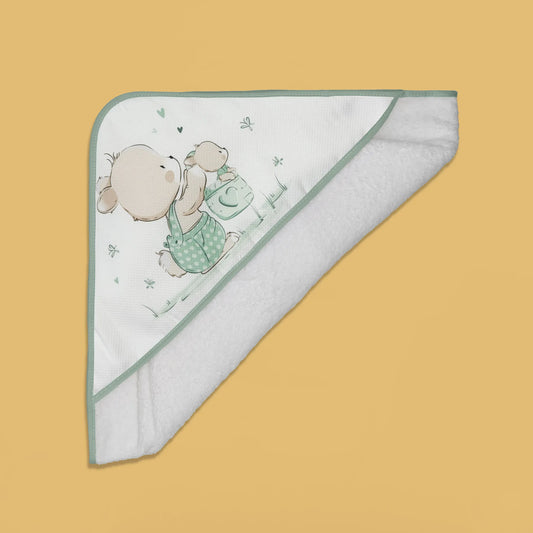 Toalla con motivo de conejito en la cesta verde